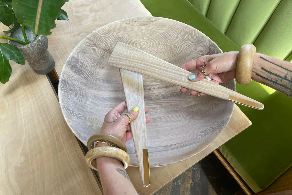 Serving Spoons photographed in warm wooden kitchen styling